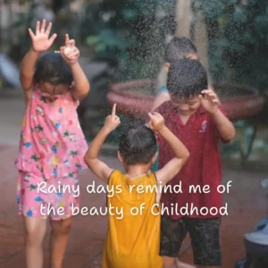 Childrens dancing and enjoying the rain, jumping over puddles in the rain