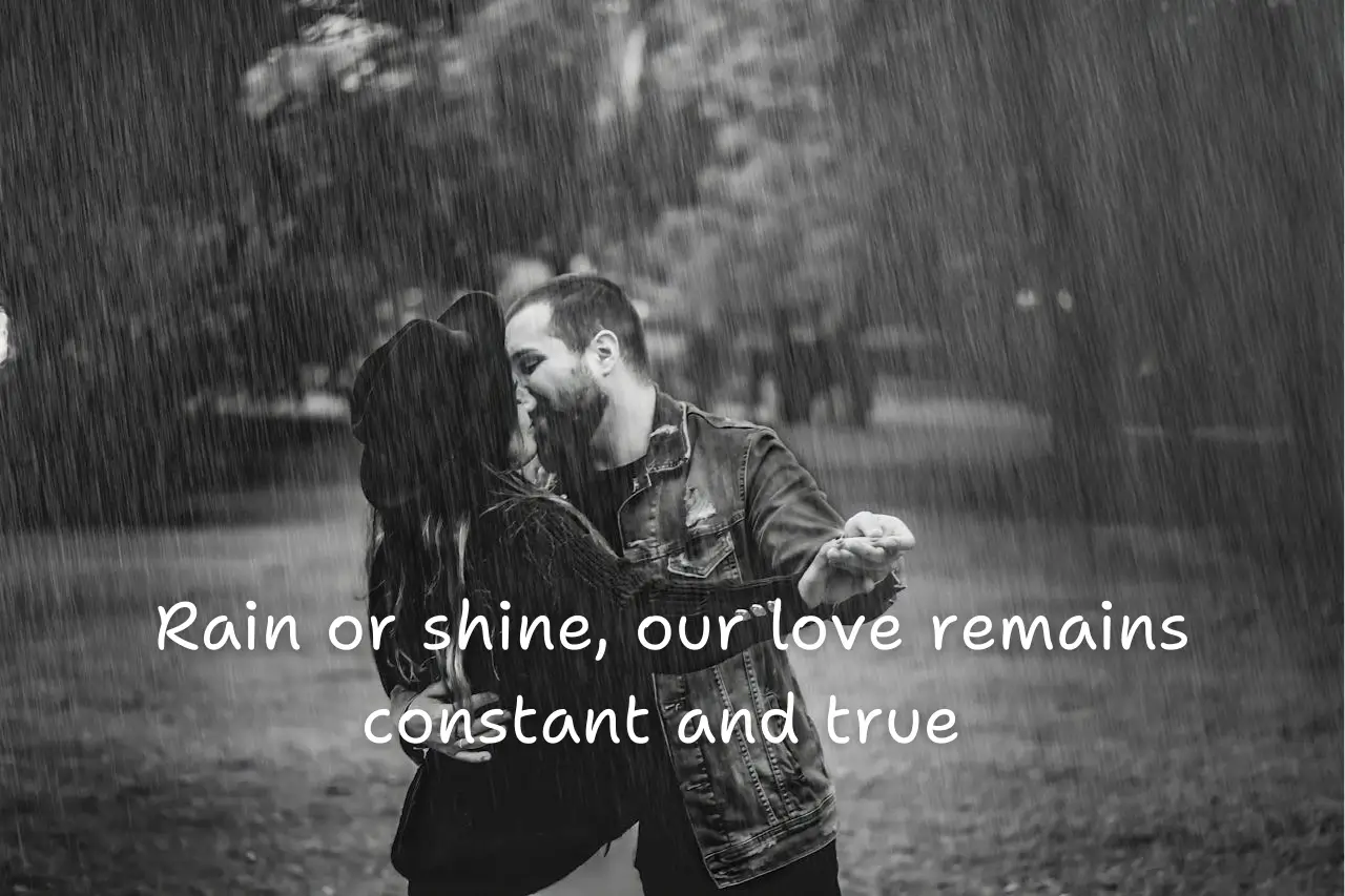 Couple kissing in the rain
